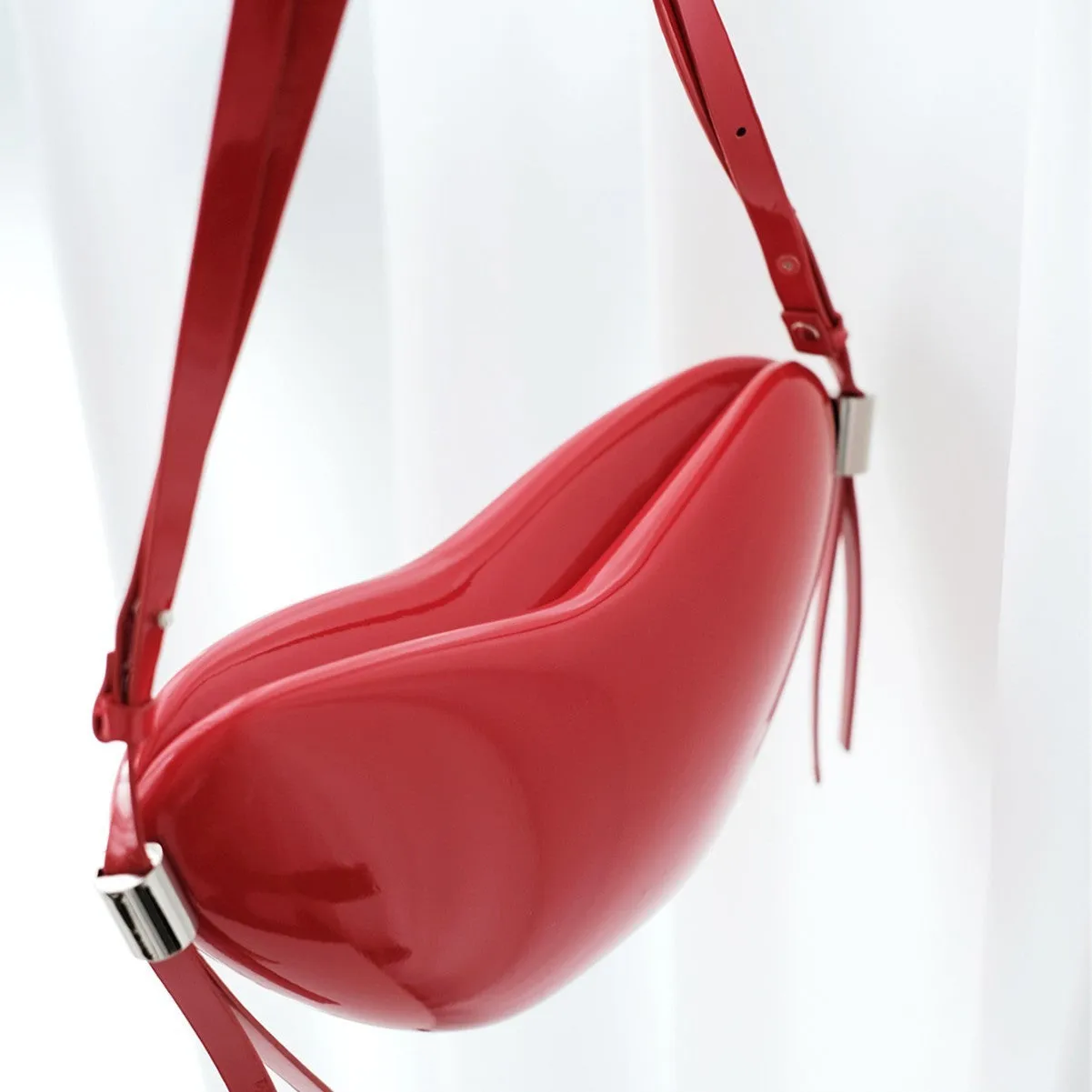 Red heart shape PU crossbody bag with sandwich pocket and single shoulder strap for women urban simplicity daily use