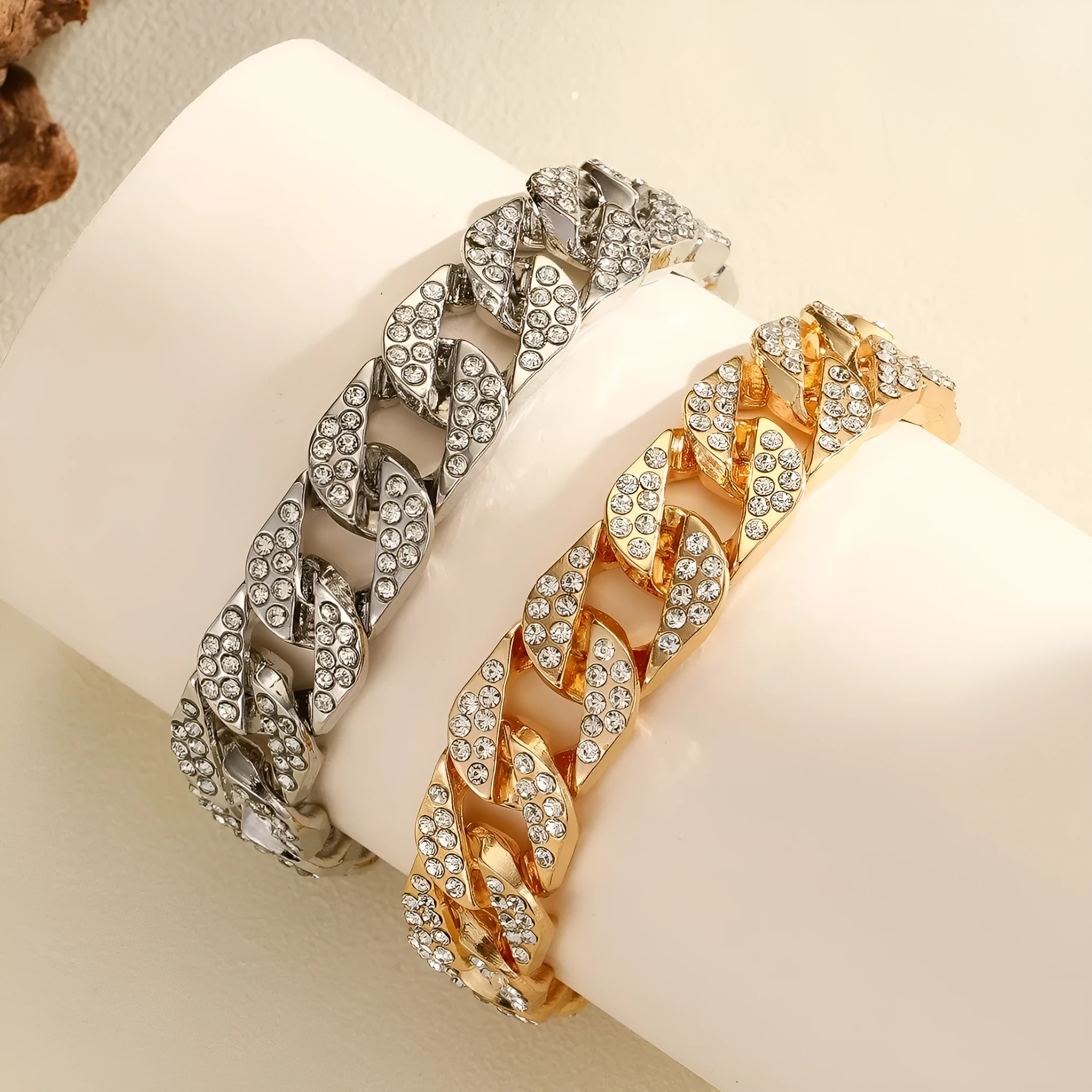Full diamond heavy metal rap bracelet in gold with chunky link construction and diamond cut surface.
