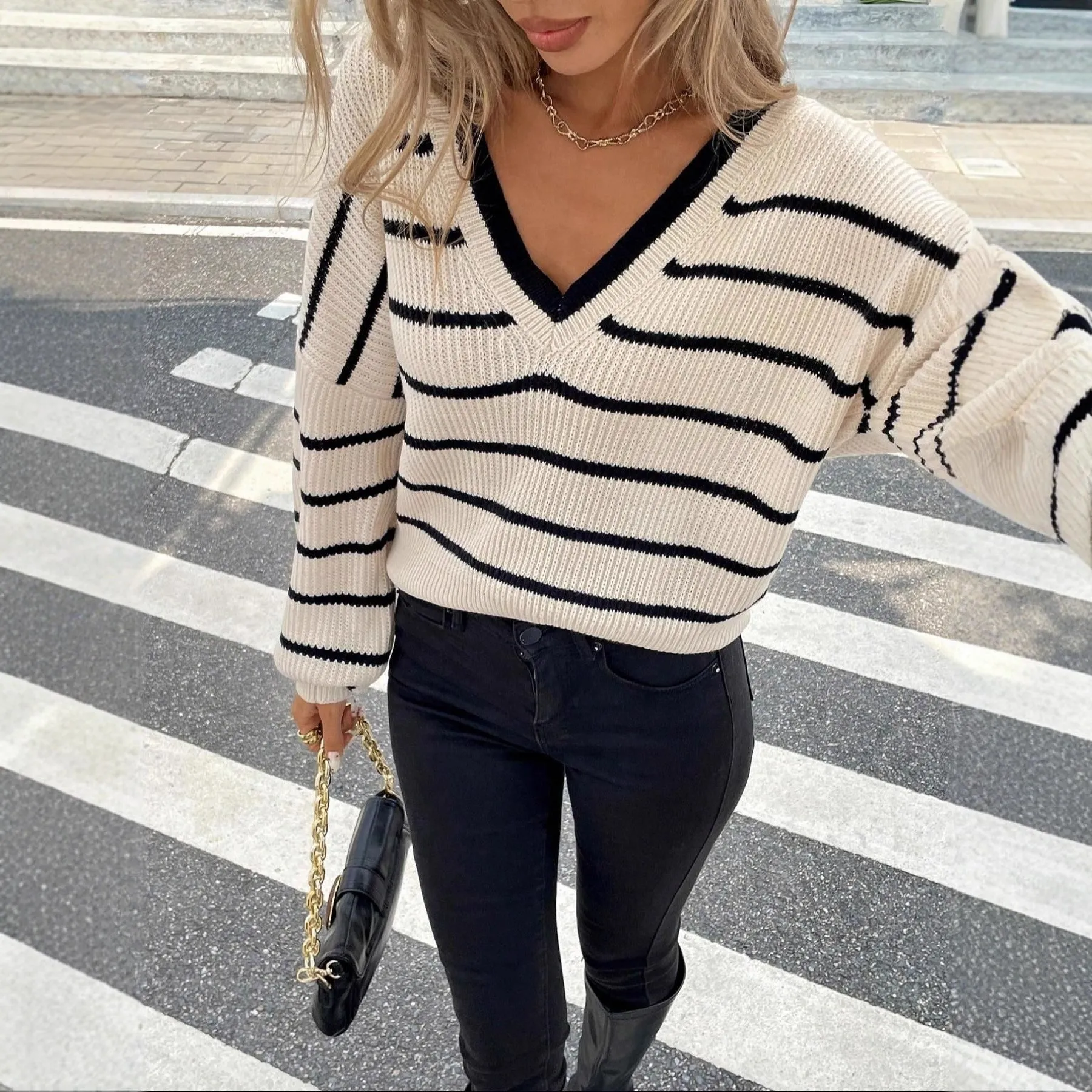 Loose fit striped polyester pullover top in apricot colour, street hipster style, front view