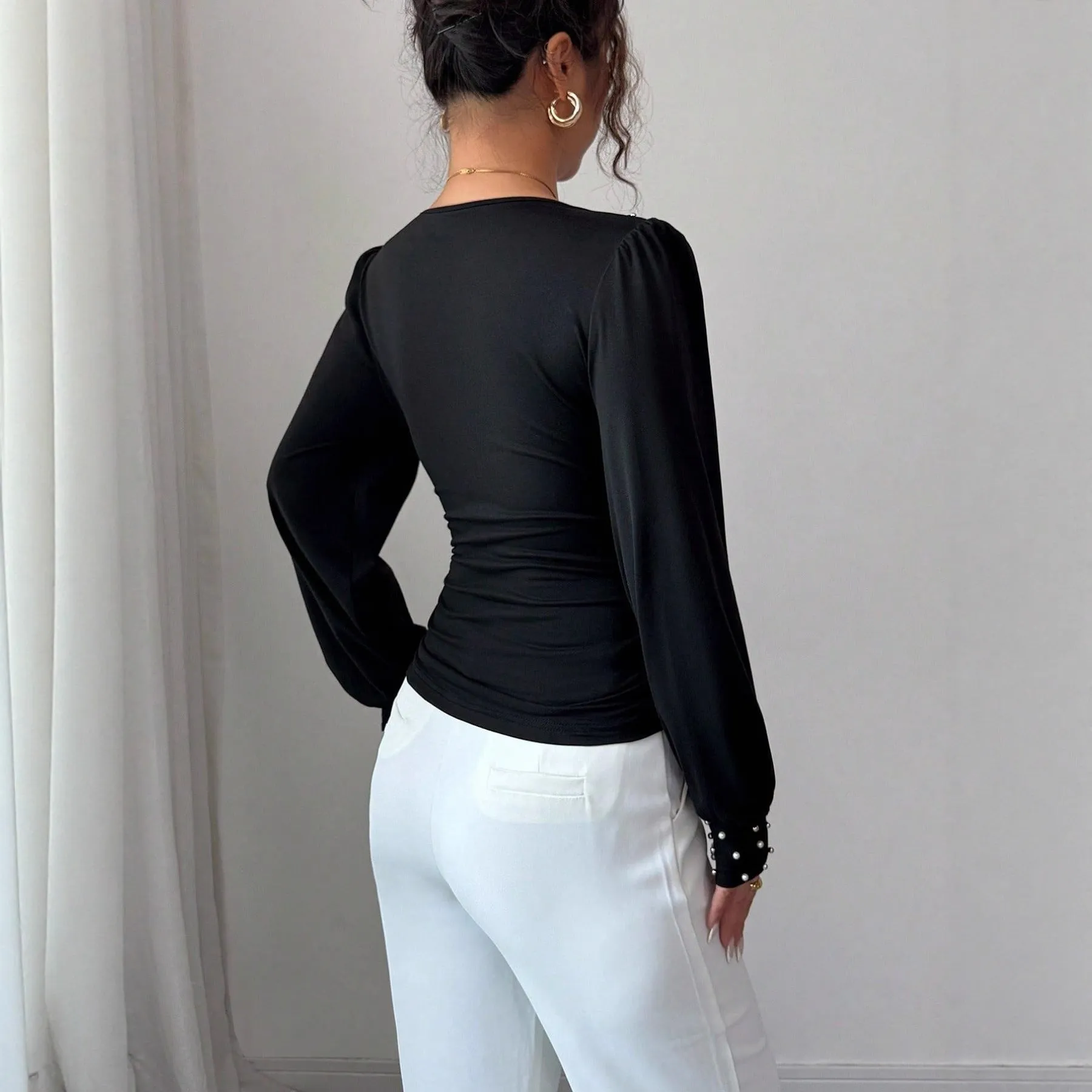 Women's solid colour bell sleeve t-shirt in black, v-neck, fitted polyester