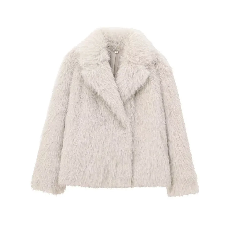 Women's white faux fur jacket with lapel collar and long sleeves shown on mannequin