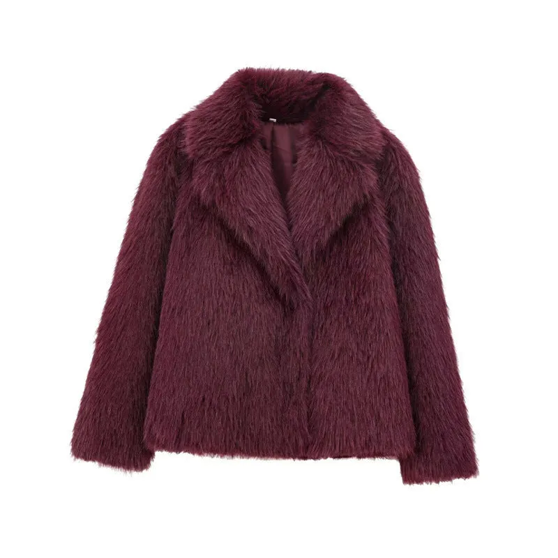 Women's white faux fur jacket with lapel collar and long sleeves shown on mannequin