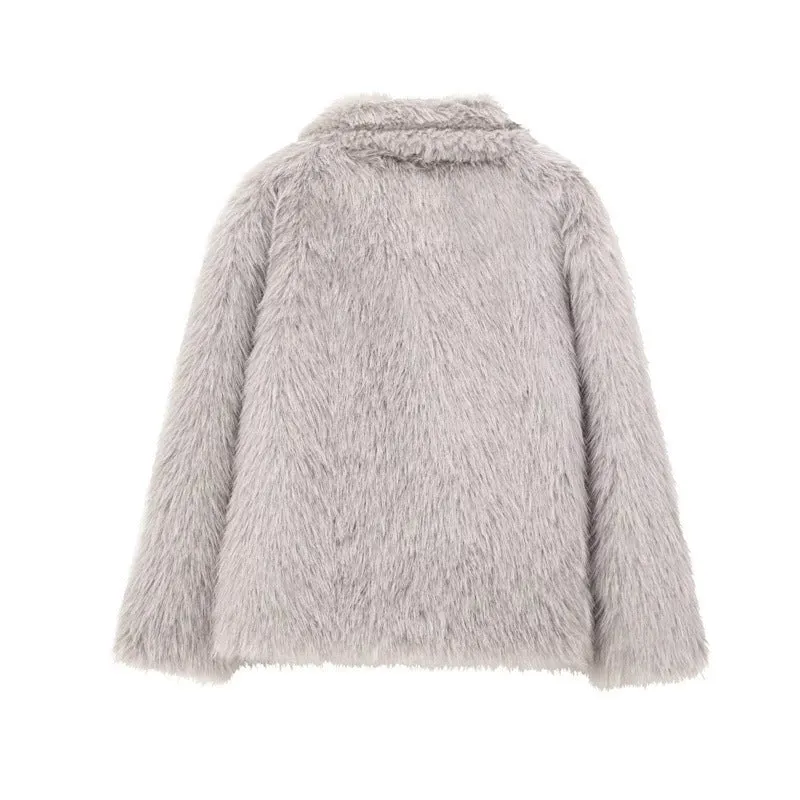 Women's white faux fur jacket with lapel collar and long sleeves shown on mannequin