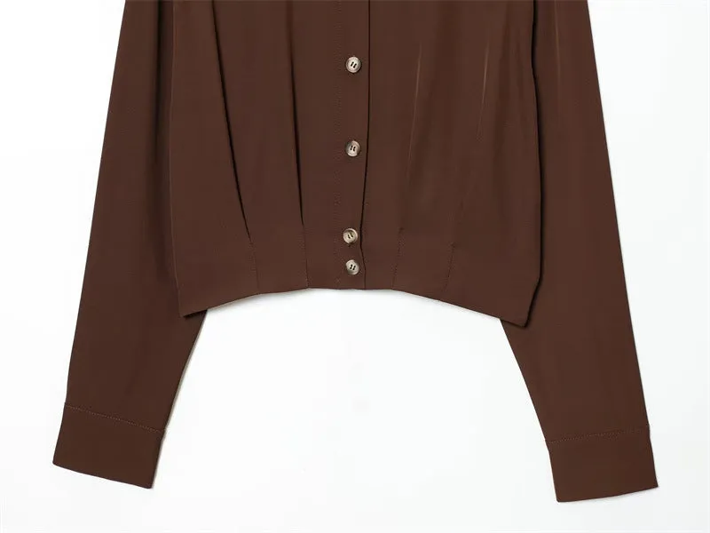 Women's loose fit brown polyester shirt with all-over plants and flowers print, shoulder strap style, front view