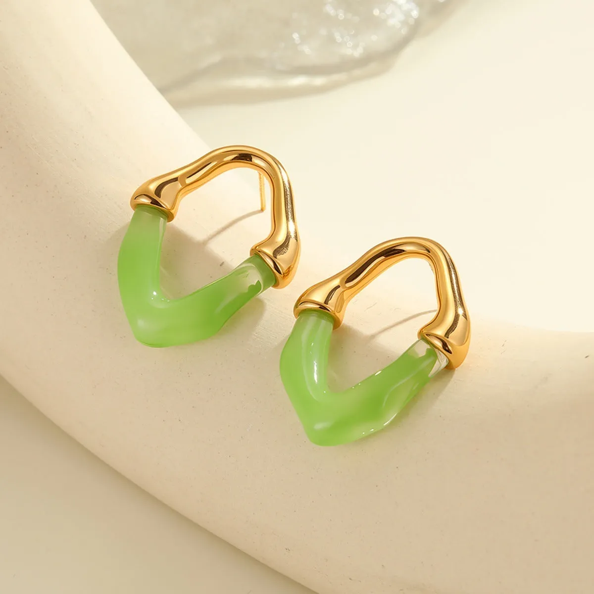 Women's stainless steel drop earrings with colour resin stitching and 18K electroplated finish in pink option
