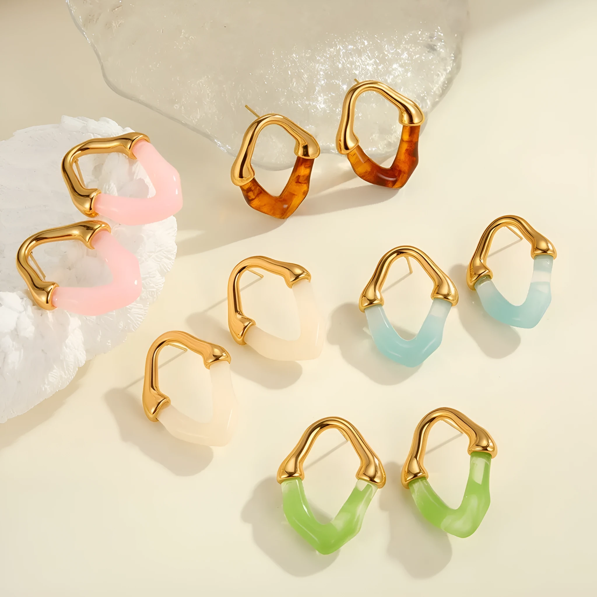 Women's stainless steel drop earrings with colour resin stitching and 18K electroplated finish in pink option