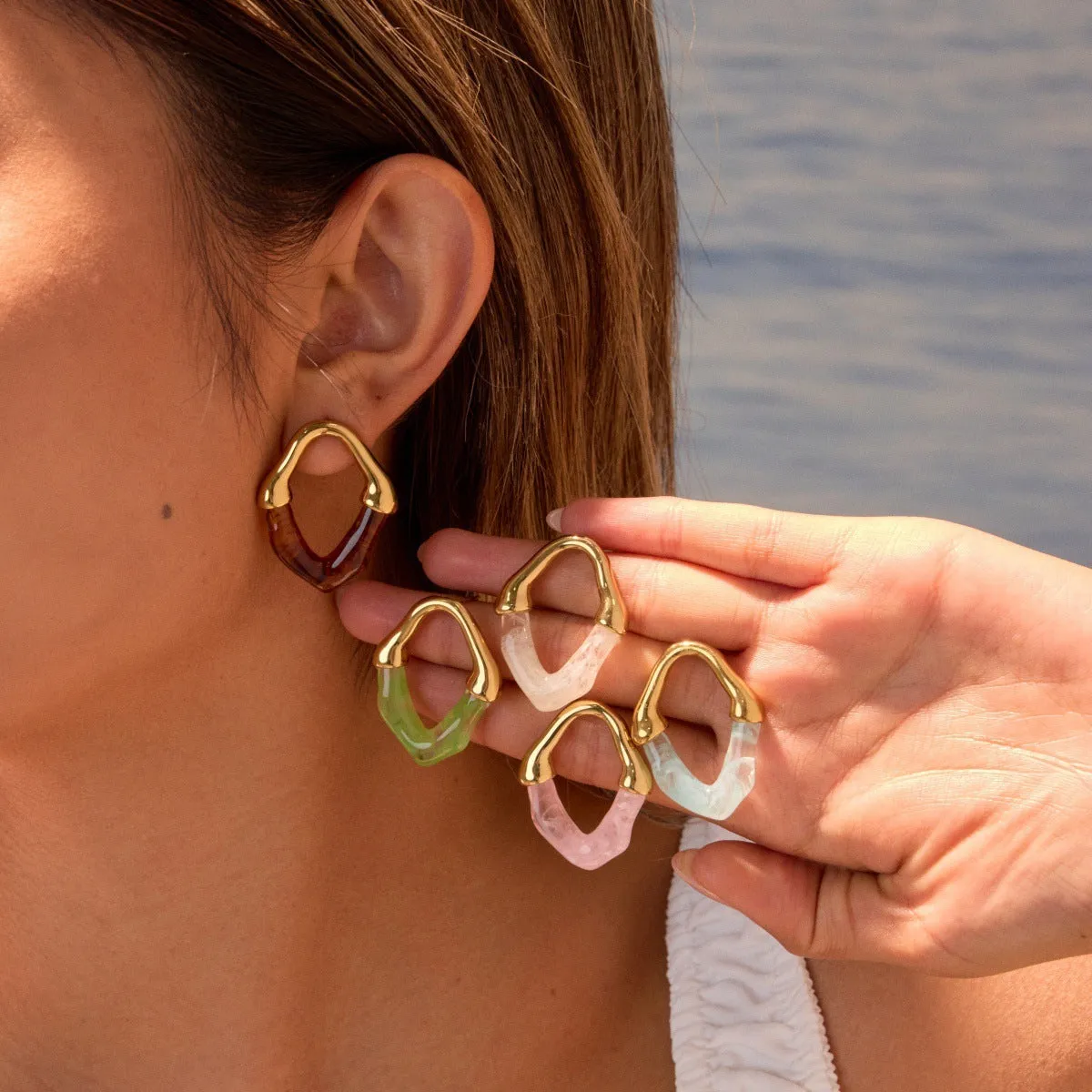 Women's stainless steel drop earrings with colour resin stitching and 18K electroplated finish in pink option