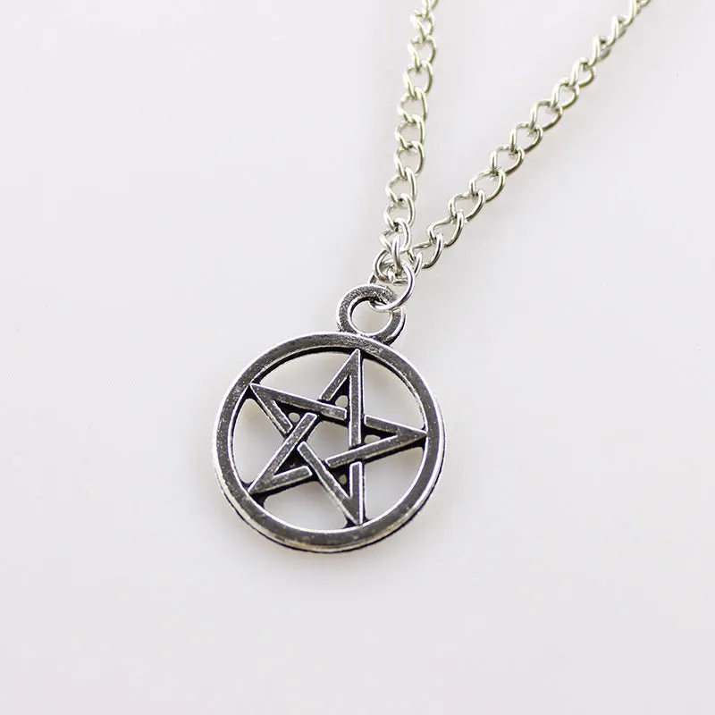 Vintage pentagram necklace with alloy pendant and adjustable chain in bronze colour on neutral background