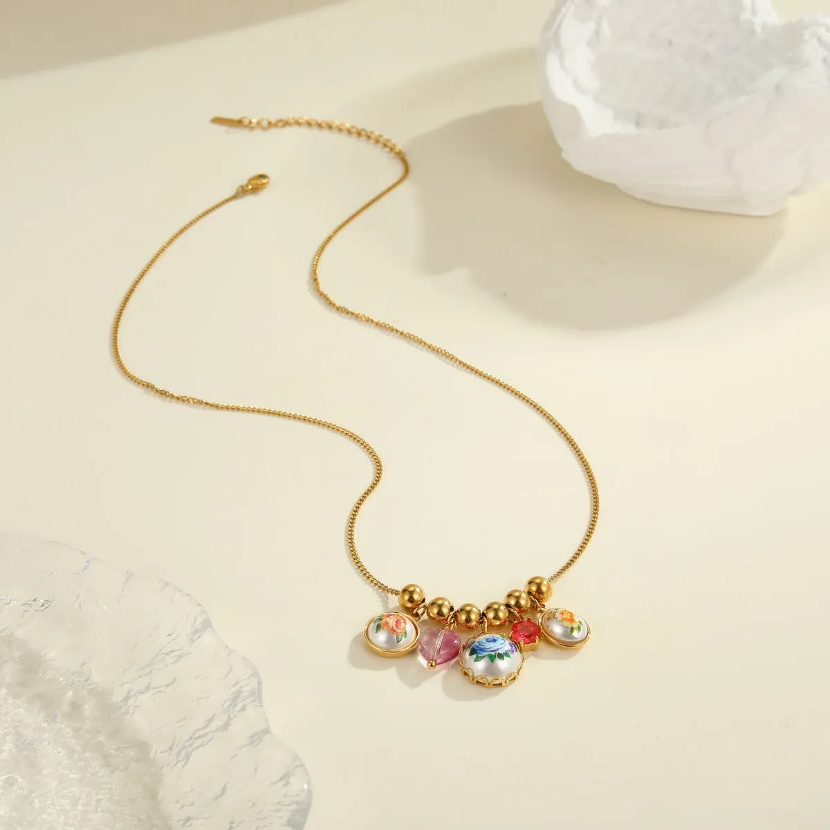 Vintage sunflower stainless steel necklace with 18K gold electroplating, pendant on display, two colour variants available