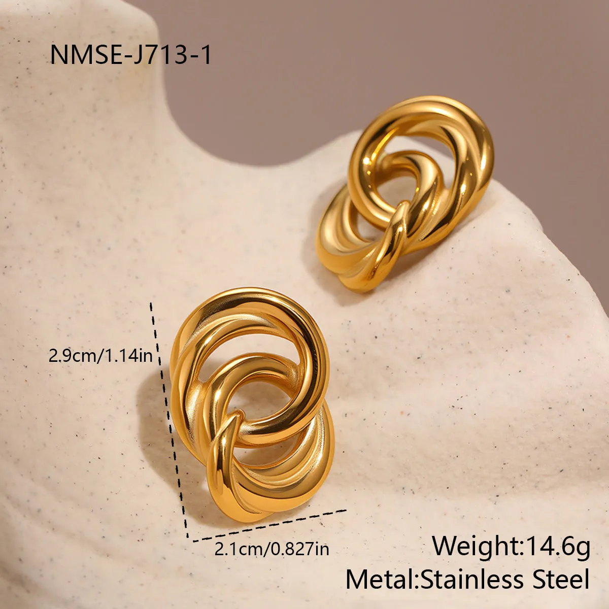 Gold geometric stud earrings with 18K electroplated finish on stainless steel
