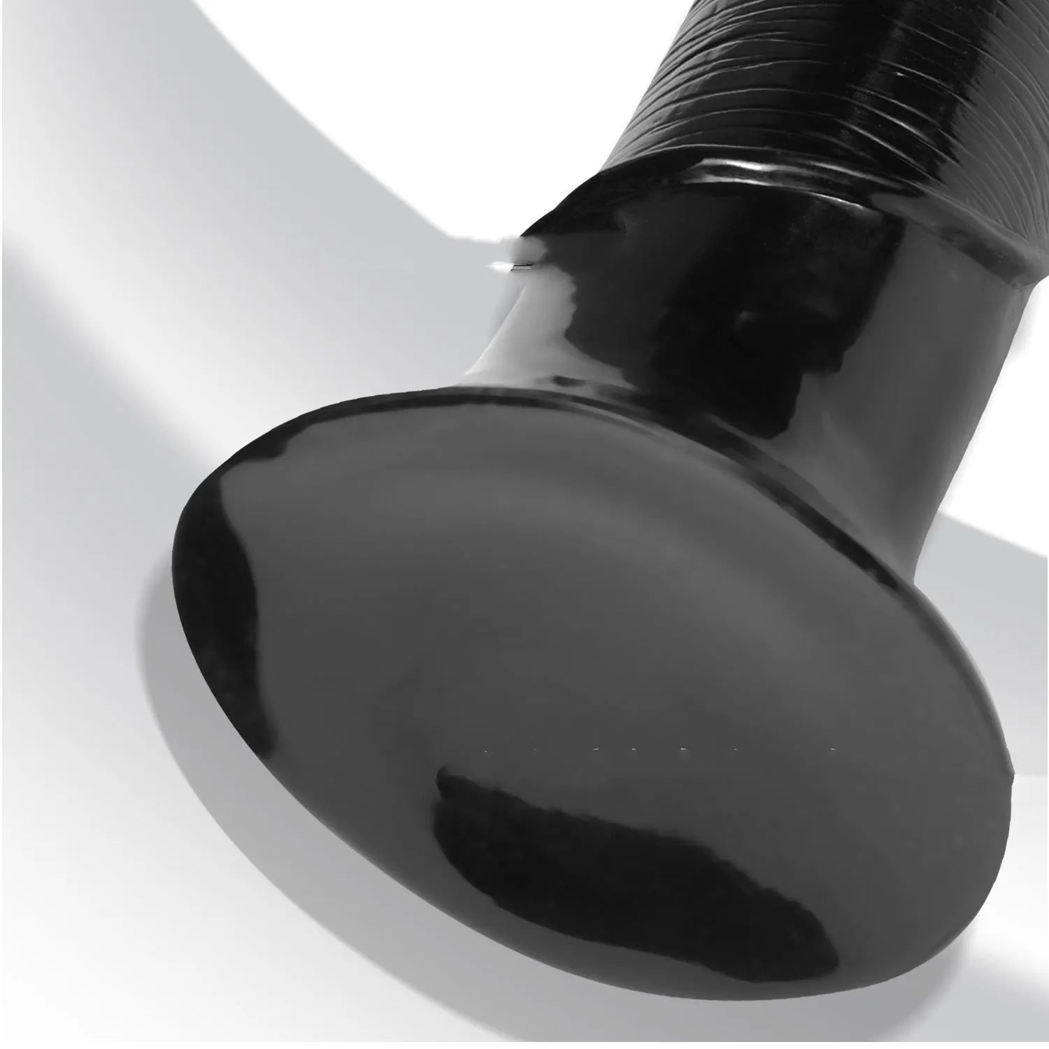 Black flesh colour PVC horsewhip with special-shaped super-long design on plain background