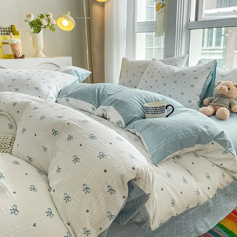 Aerobic jacquard cloud yarn chemical fibre bedding set in multiple colours and sizes, including sheet, pillowcases, and quilt cover.