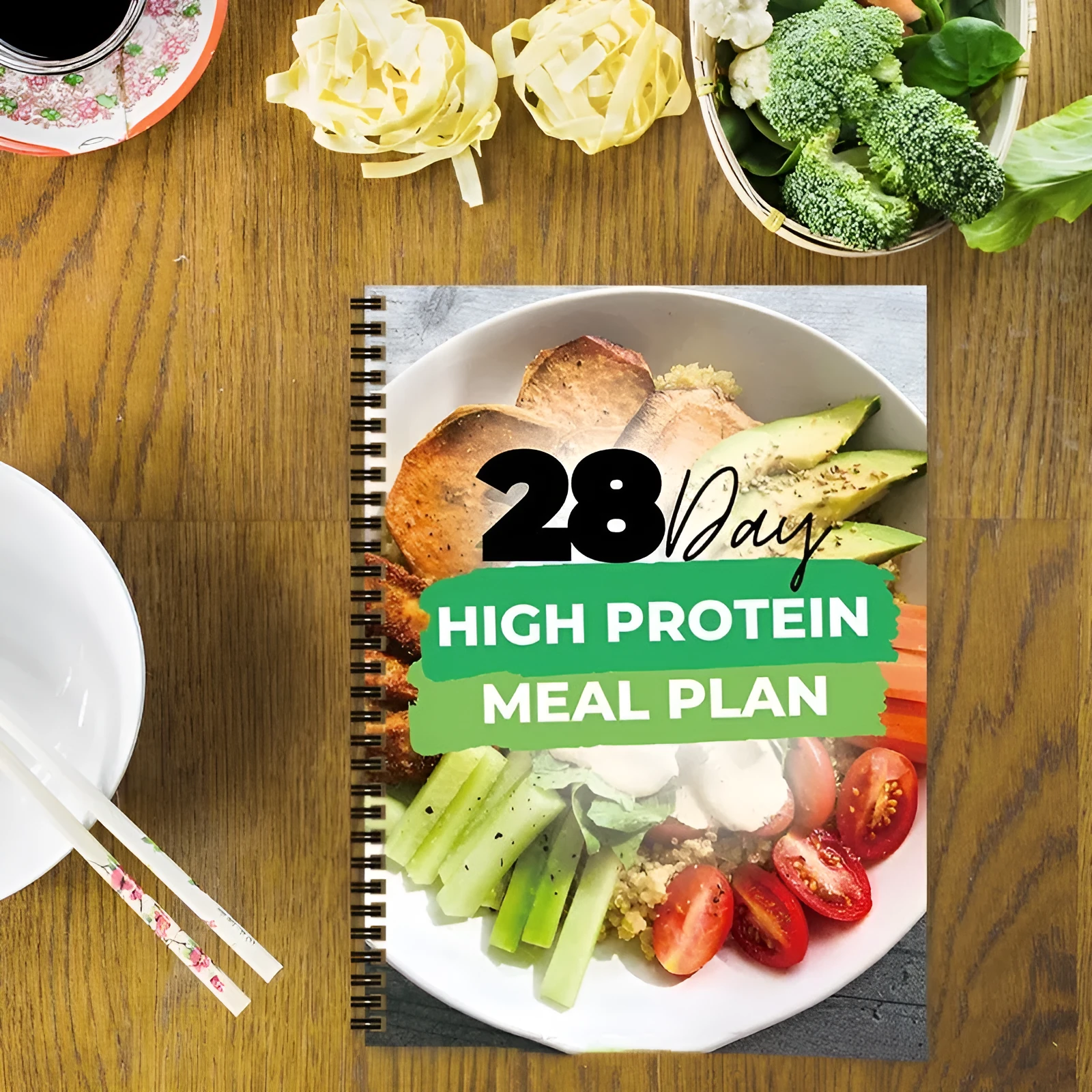 28-day high-protein diet plan book on paper, A4 size 21cm by 28.5cm, with cover titled 28Day Dietary Plan