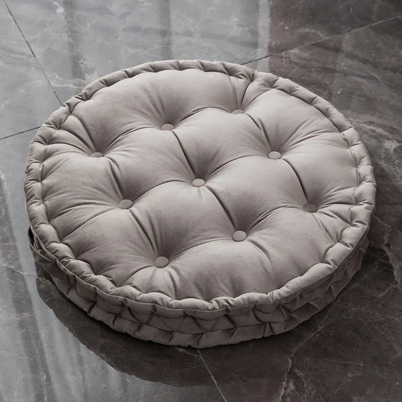 Round floor cushion in dark red showing 60cm diameter polyester futon style