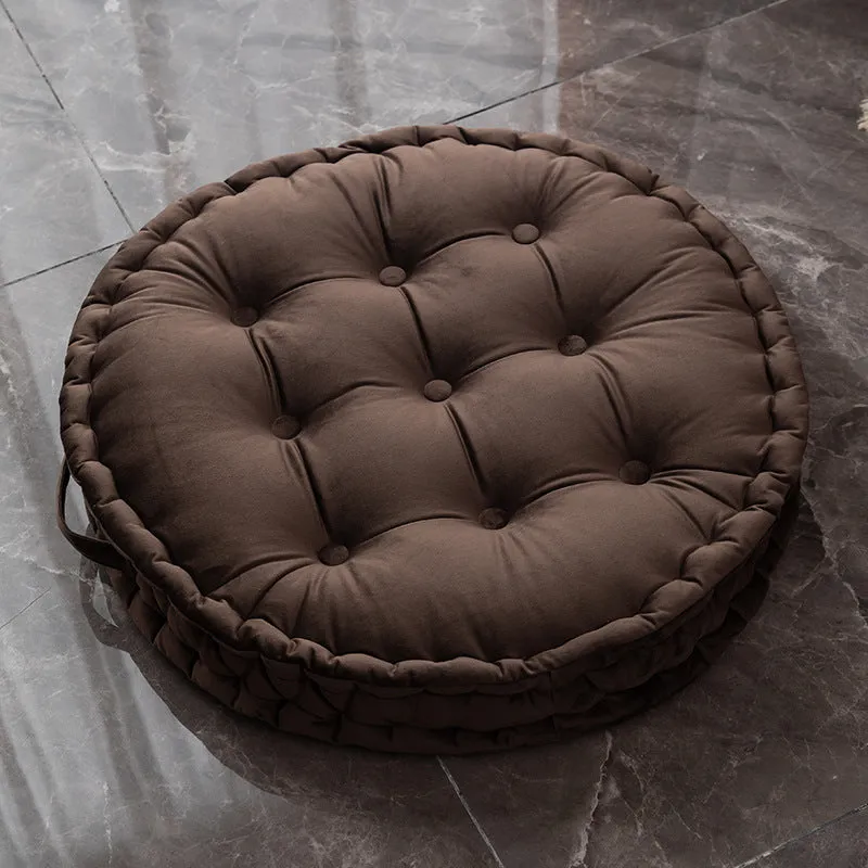 Round floor cushion in dark red showing 60cm diameter polyester futon style