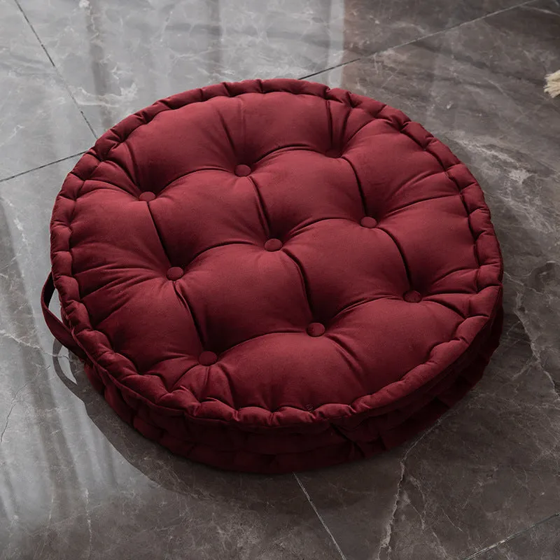 Round floor cushion in dark red showing 60cm diameter polyester futon style