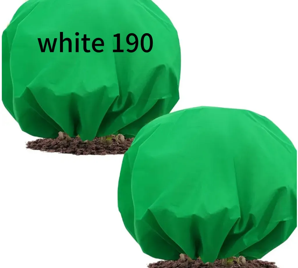 Round green non-woven plant frost cover with drawstring resting on grass, showing 1.9m diameter size