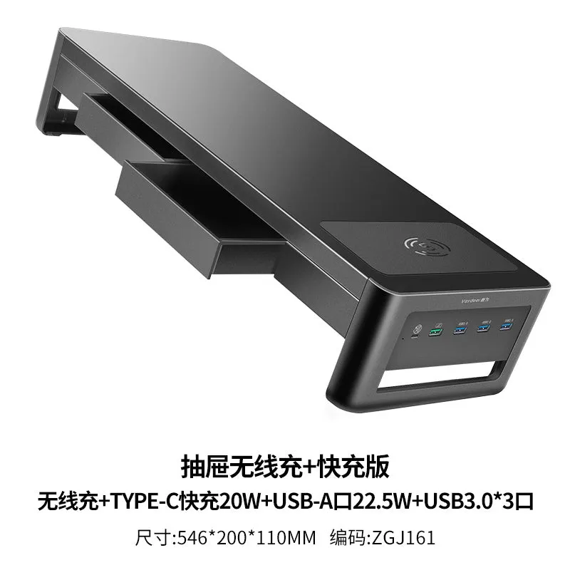 Desktop screen stand with drawer in black, featuring USB and wireless charging ports under monitor