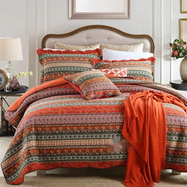 Quilted pure cotton bed cover set with printed pattern on bed, includes two pillowcases.