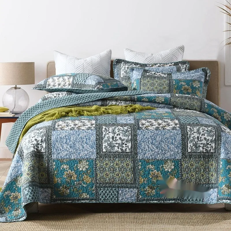 Quilted pure cotton bed cover set with printed pattern on bed, includes two pillowcases.