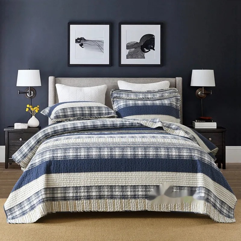Quilted pure cotton bed cover set with printed pattern on bed, includes two pillowcases.