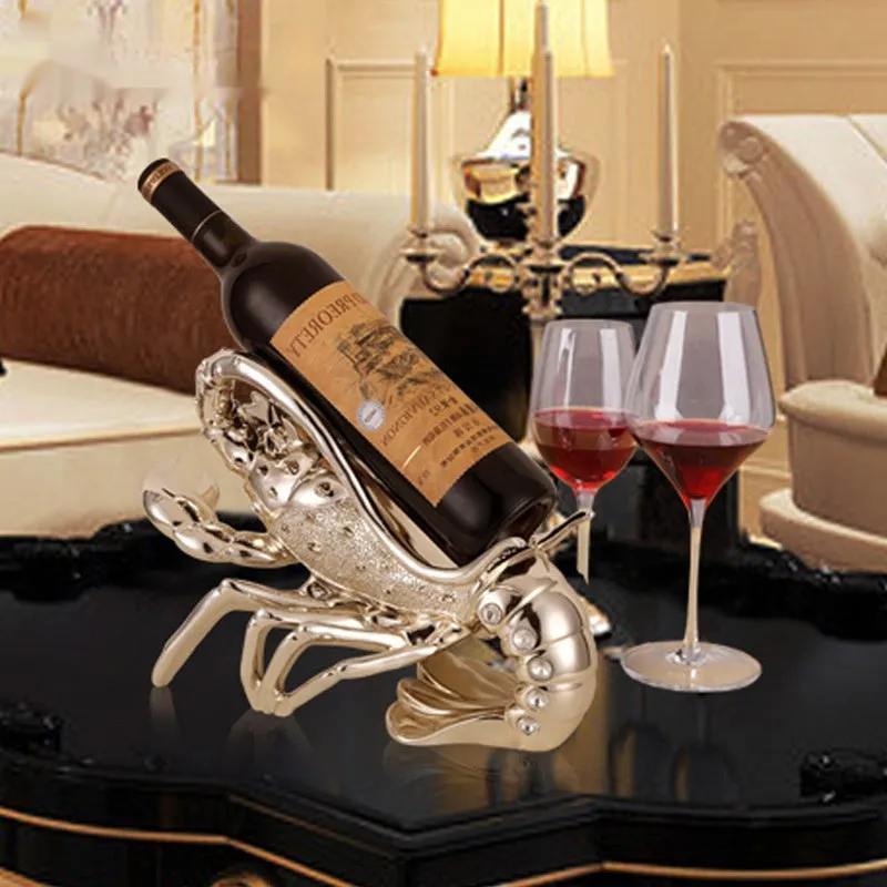 Lobster-shaped resin wine rack in silver or rose gold holding two bottles