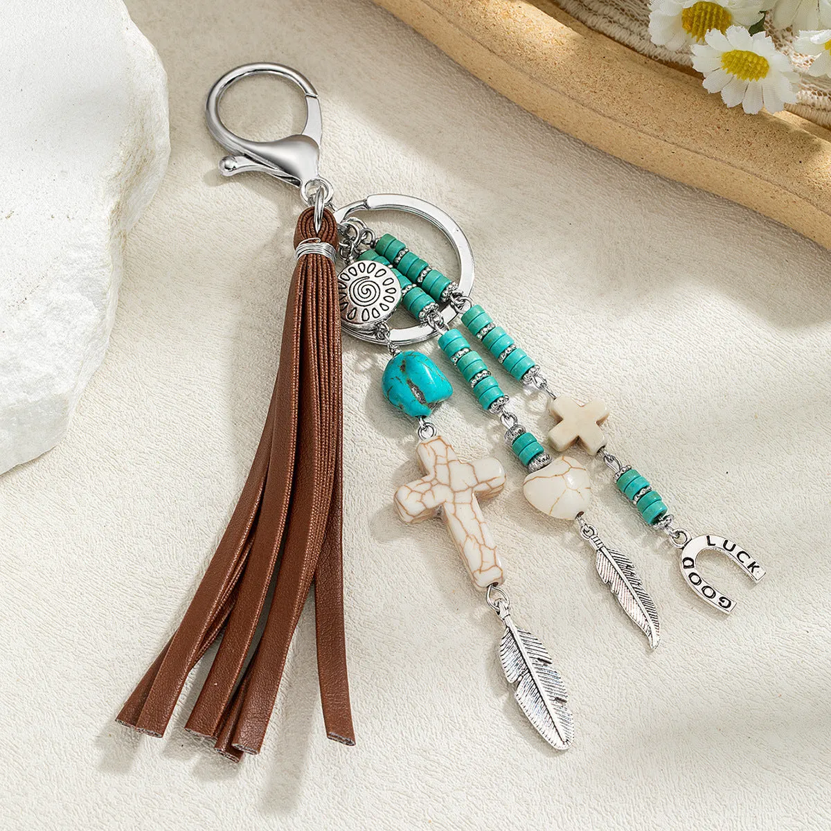 Cross alloy leather tassel pendant keychain in retro style, colour XY-3669, on a neutral background