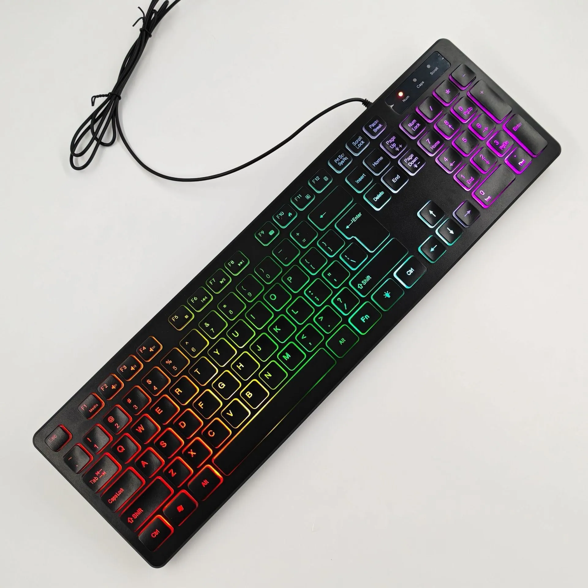 USB wired plastic keyboard with backlight and multilingual key legends in low light