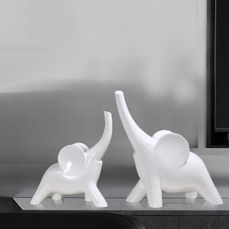 Large rose gold resin elephant ornament with modern simplicity style on a shelf