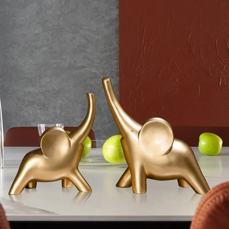 Large rose gold resin elephant ornament with modern simplicity style on a shelf
