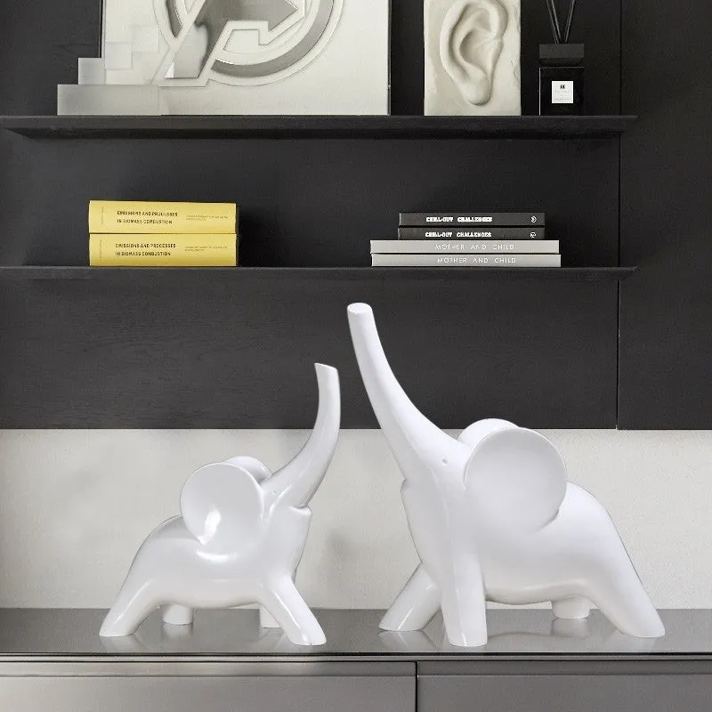 Large rose gold resin elephant ornament with modern simplicity style on a shelf