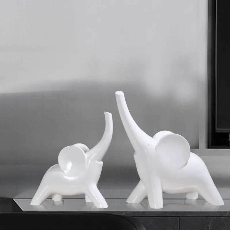Large rose gold resin elephant ornament with modern simplicity style on a shelf