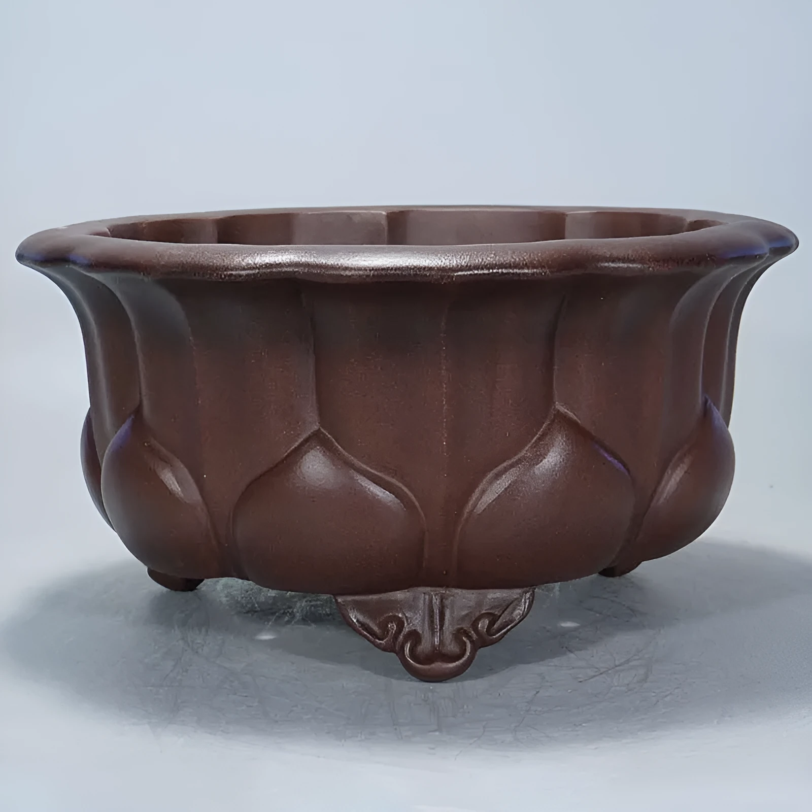 Square purple-red antique Petal Basin flowerpot for bonsai plants on a surface.