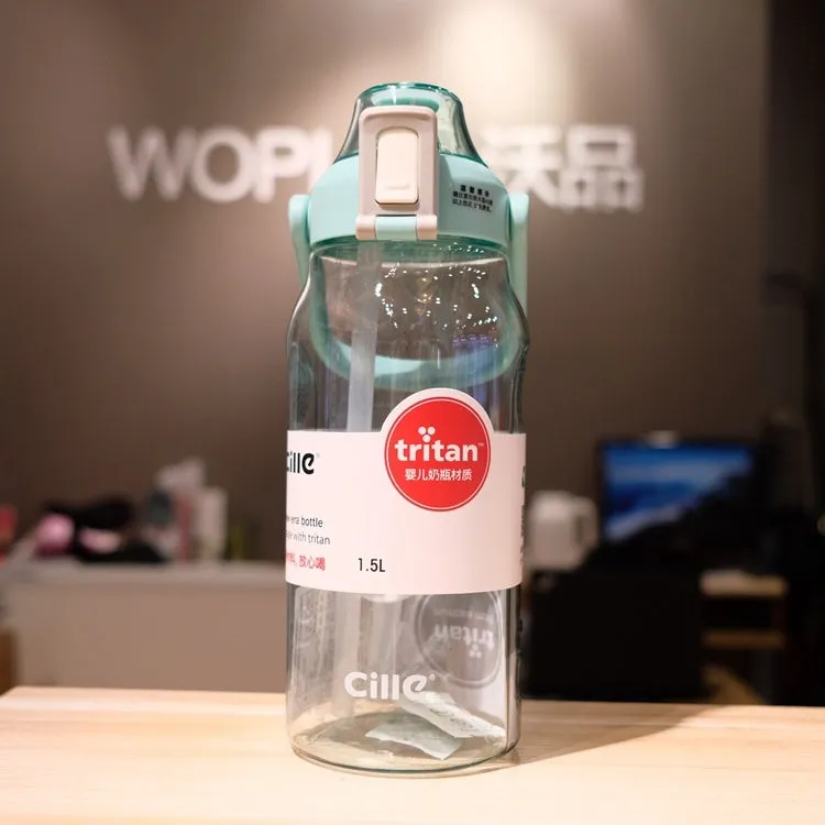 Grey plastic water bottle with black cap and clear straw showing scale markings on the side