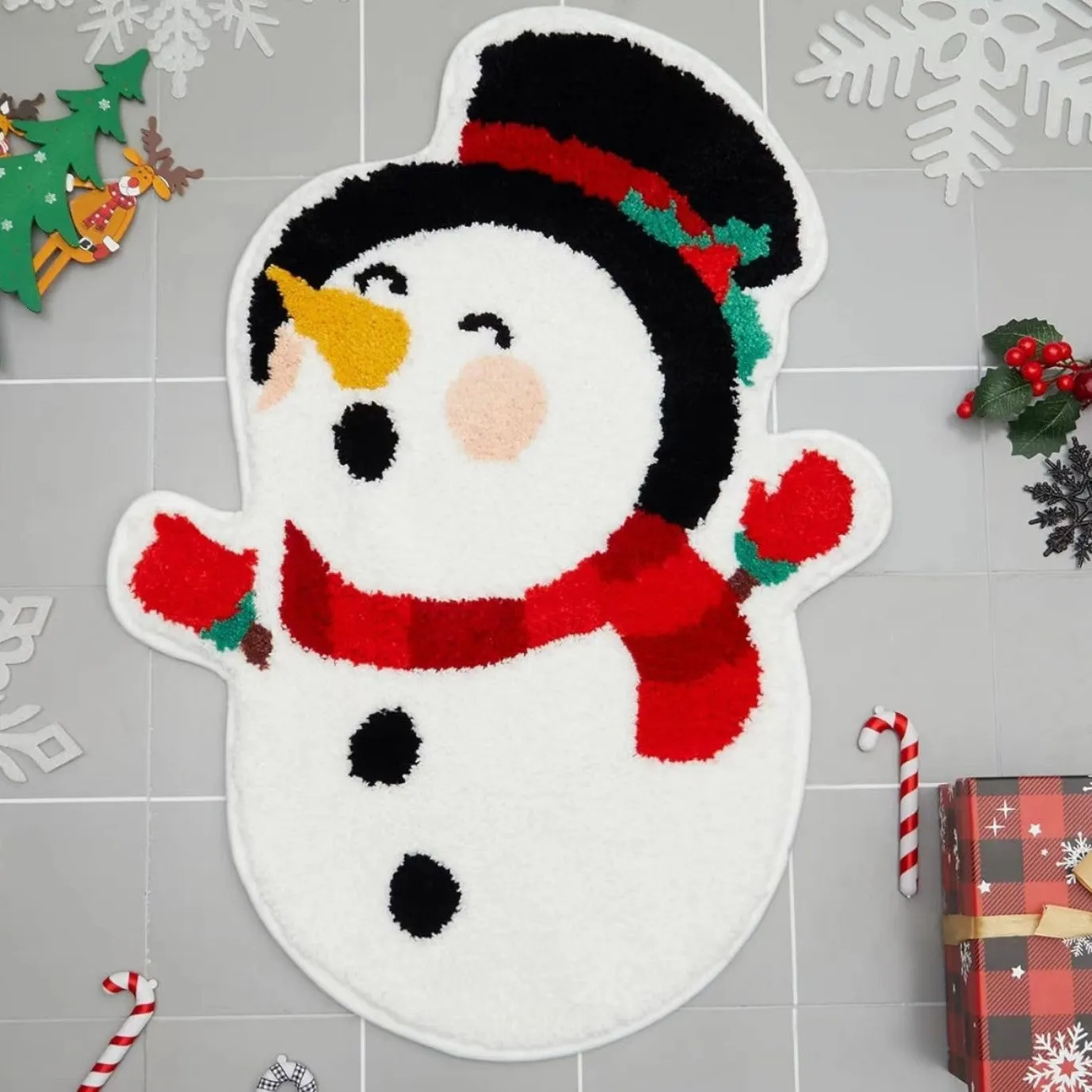 Christmas hallway mat with irregular shape and festive printed designs including Santa Claus pattern