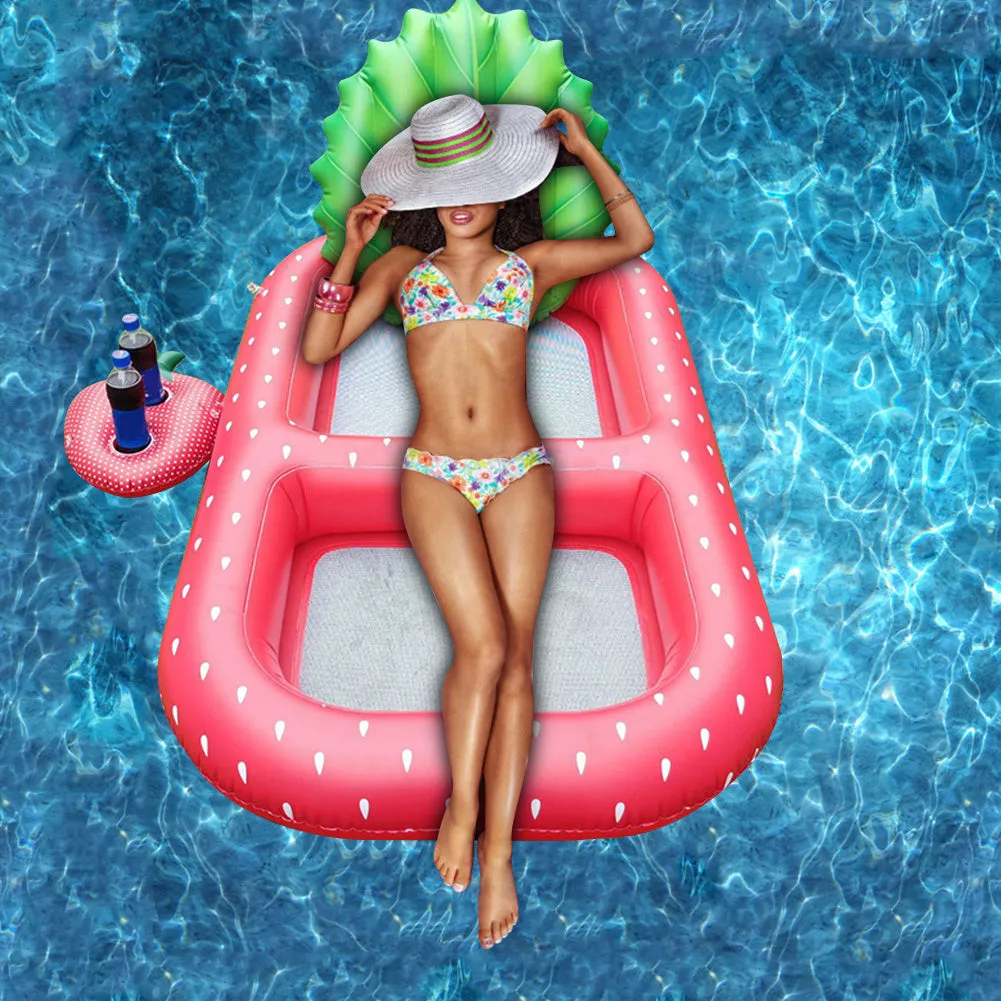 Inflatable pineapple pool lounger with cup holder floating on water in yellow colour