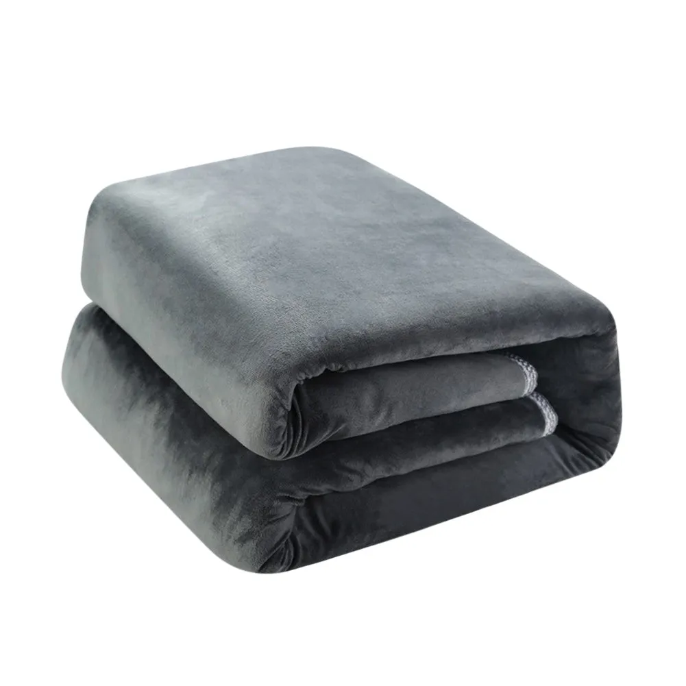 Grey tweed electric heating blanket on a bed, showing simple solid colour design