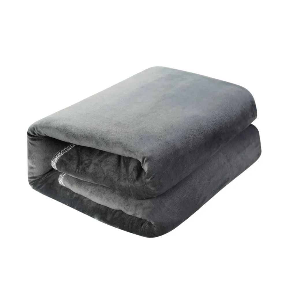 Grey tweed electric heating blanket on a bed, showing simple solid colour design