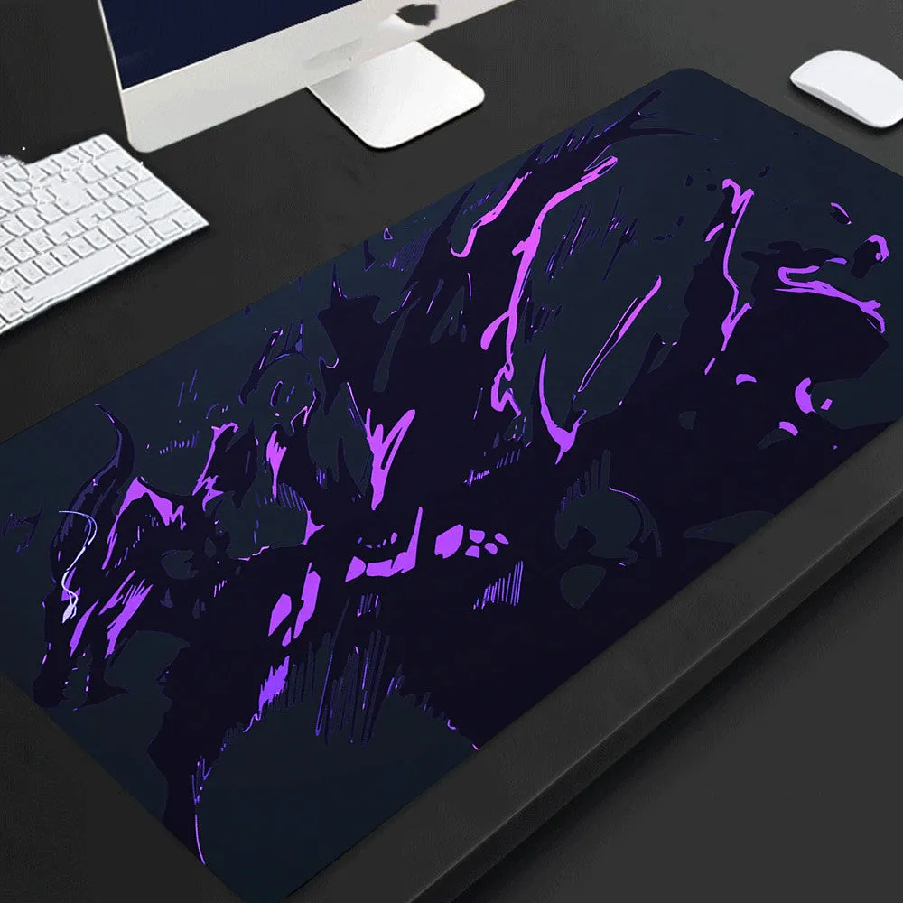 Full black extended extra long rubber mouse pad on desk for gaming and office use