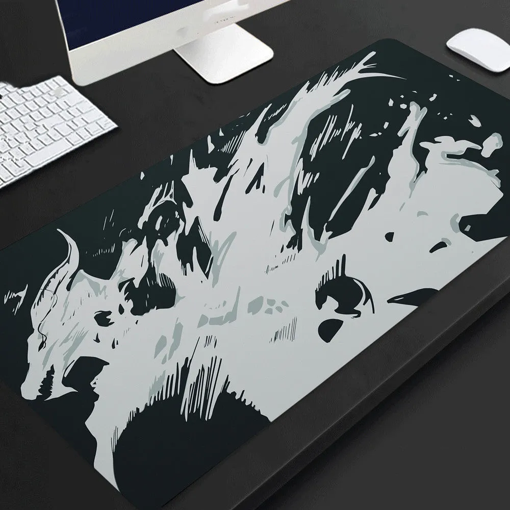 Full black extended extra long rubber mouse pad on desk for gaming and office use