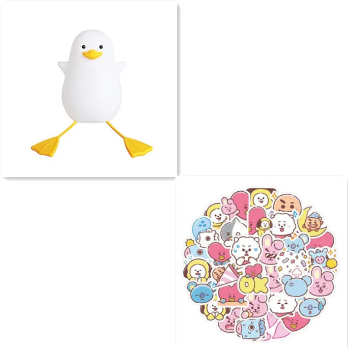 Seagull silicone night light in yellow colour with soft warm glow on bedside table