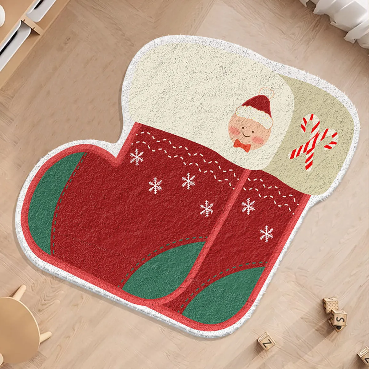 Christmas round carpet with alien shape in imitation cashmere, showing gingerbread man and holiday colour patterns