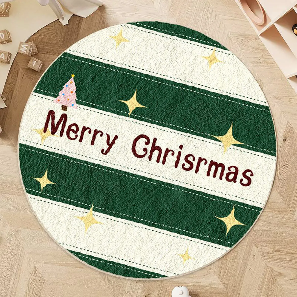 Christmas round carpet with alien shape in imitation cashmere, showing gingerbread man and holiday colour patterns