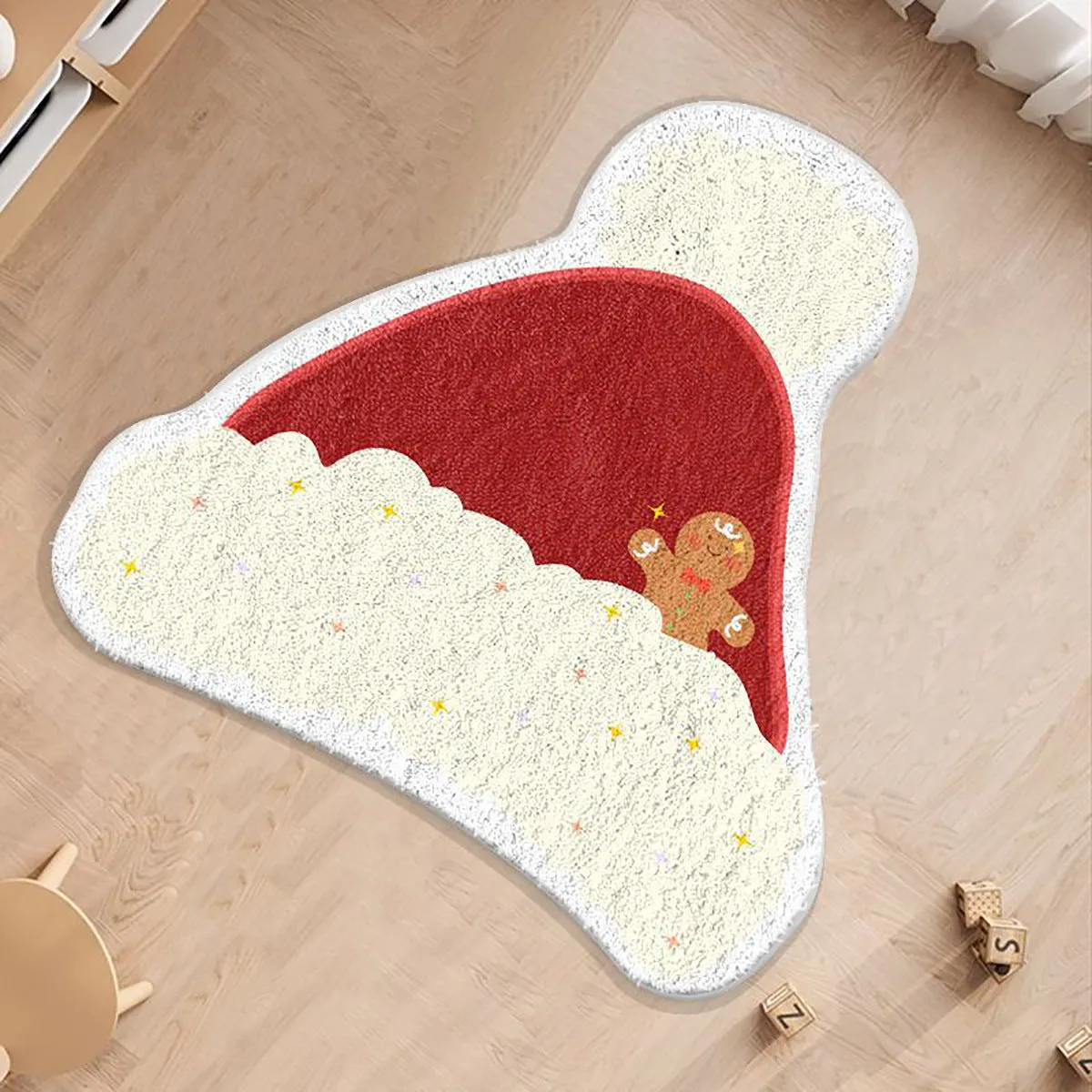 Christmas round carpet with alien shape in imitation cashmere, showing gingerbread man and holiday colour patterns