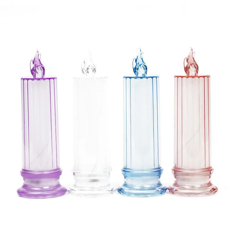 LED electronic candle lamp in ABS plastic with diamond style pattern, transparent colour, shown with base