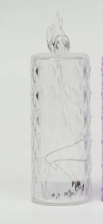 LED electronic candle lamp in ABS plastic with diamond style pattern, transparent colour, shown with base