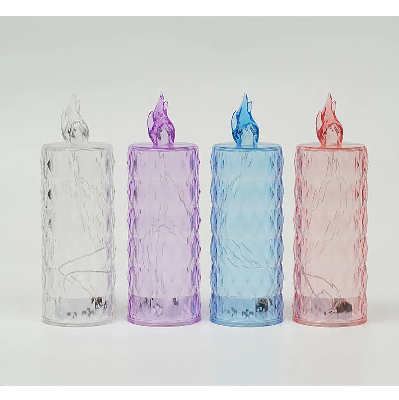 LED electronic candle lamp in ABS plastic with diamond style pattern, transparent colour, shown with base