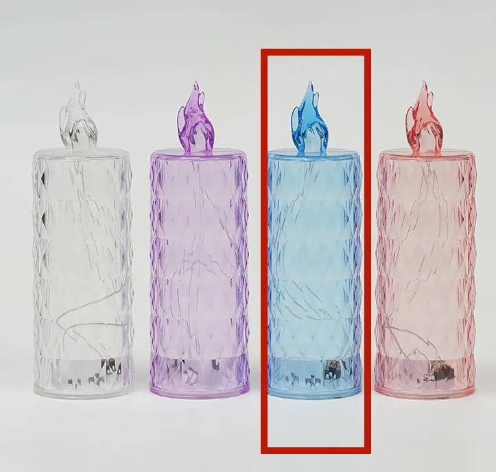 LED electronic candle lamp in ABS plastic with diamond style pattern, transparent colour, shown with base