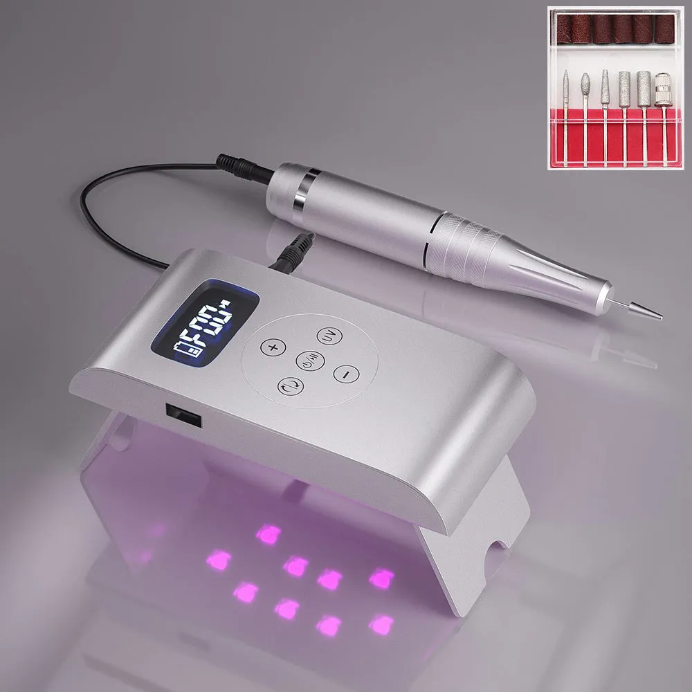 Battery nail polisher with UV lamp, stainless steel body, and 6 nail bits in silver colour