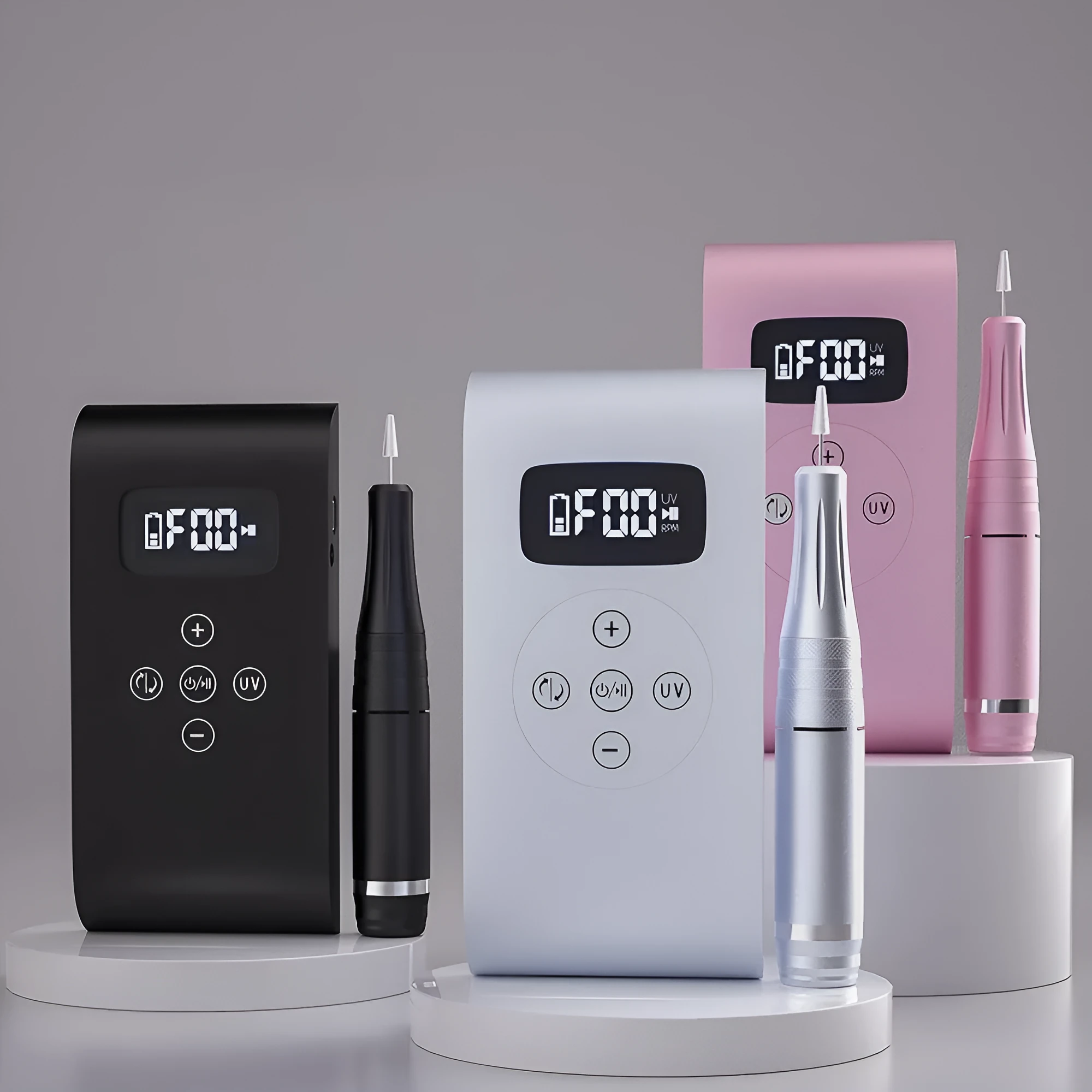 Battery nail polisher with UV lamp, stainless steel body, and 6 nail bits in silver colour